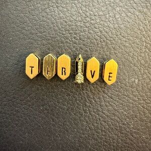 Gold Wall Decor with Rocket Design